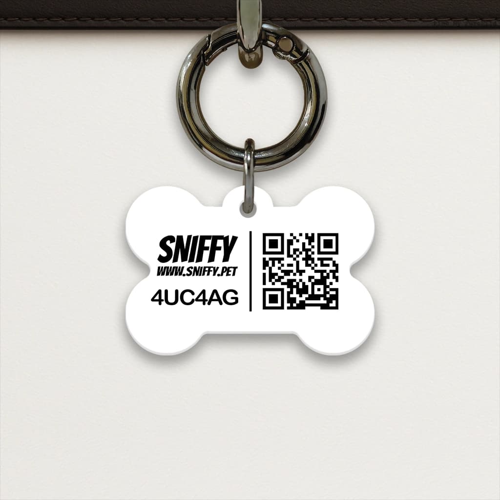 Image of the back of a SNIFFY tag in the small bone shape